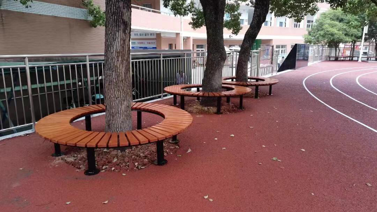 round wooden tree benches