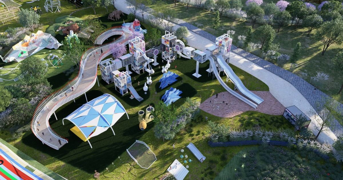 Themed playground project - aerial view of the climbing tower array, blue membrane canopy and sand pit zone (design rendering) Themed playground project - aerial view of the climbing tower array, blue membrane canopy and sand pit zone (design rendering)