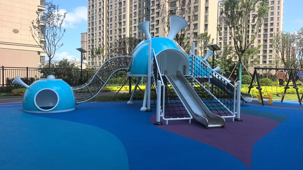 snail shaped composite play unit with crawl tunnel and double slide for a low age zone snail shaped composite play unit with crawl tunnel and double slide for a low age zone