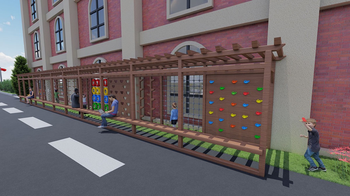 Multi-functional playground climbing wall integrated into kindergarten corridor Multi-functional playground climbing wall integrated into kindergarten corridor